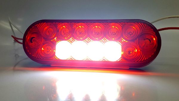 6 Inch Oval LED Stop Turn Tail and Reverse Light 13 Red 4 White Diodes Grommet Mount
